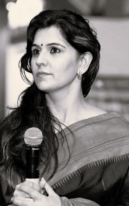 Dipika Trehan speaking on stage